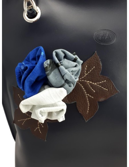 Meloni lavorazione artigiana borsa shopping in pelle con applicazioni